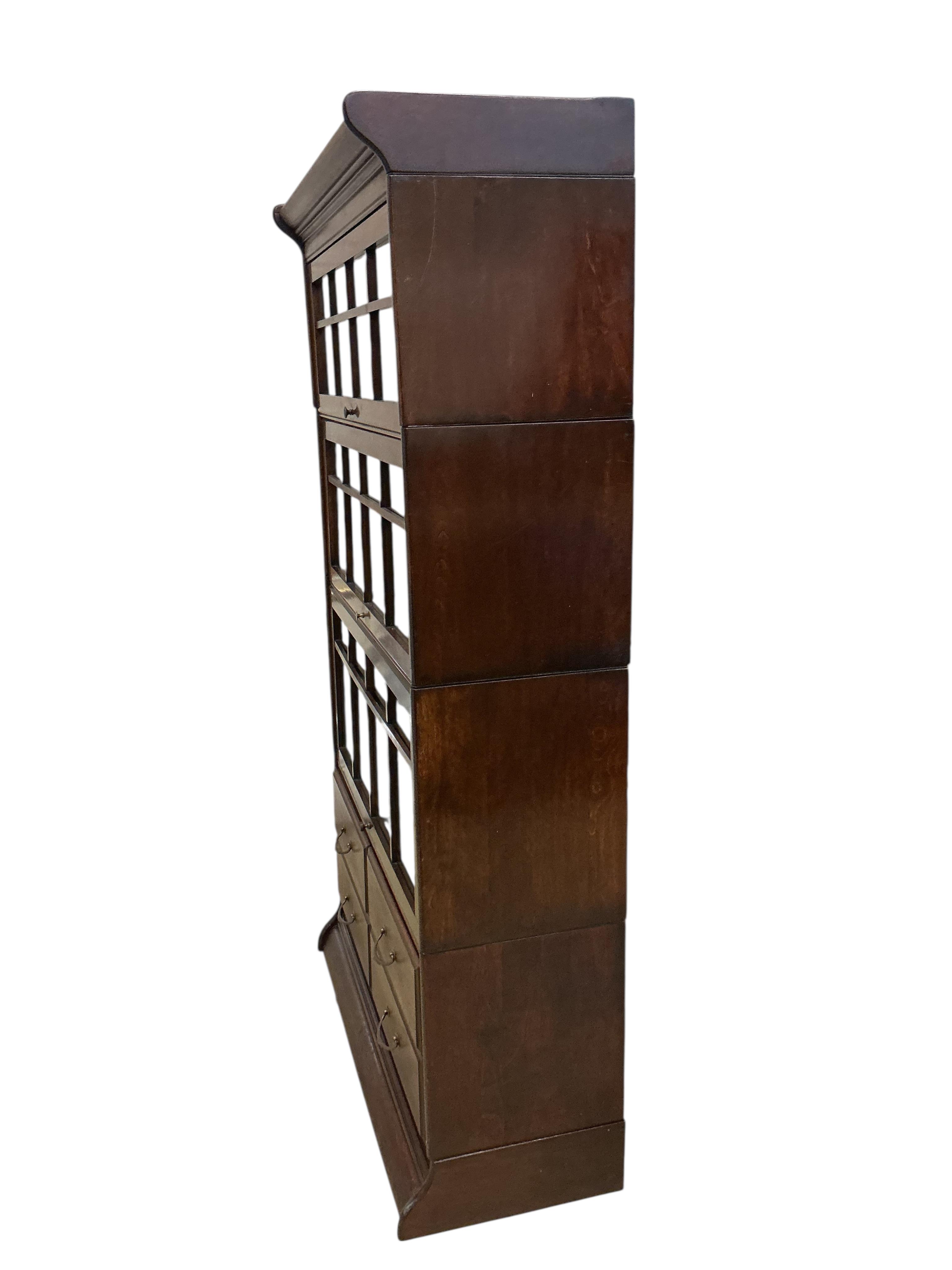 A Globe Wernicke style mahogany four section bookcase, width 87cm, depth 35cm, height 157cm